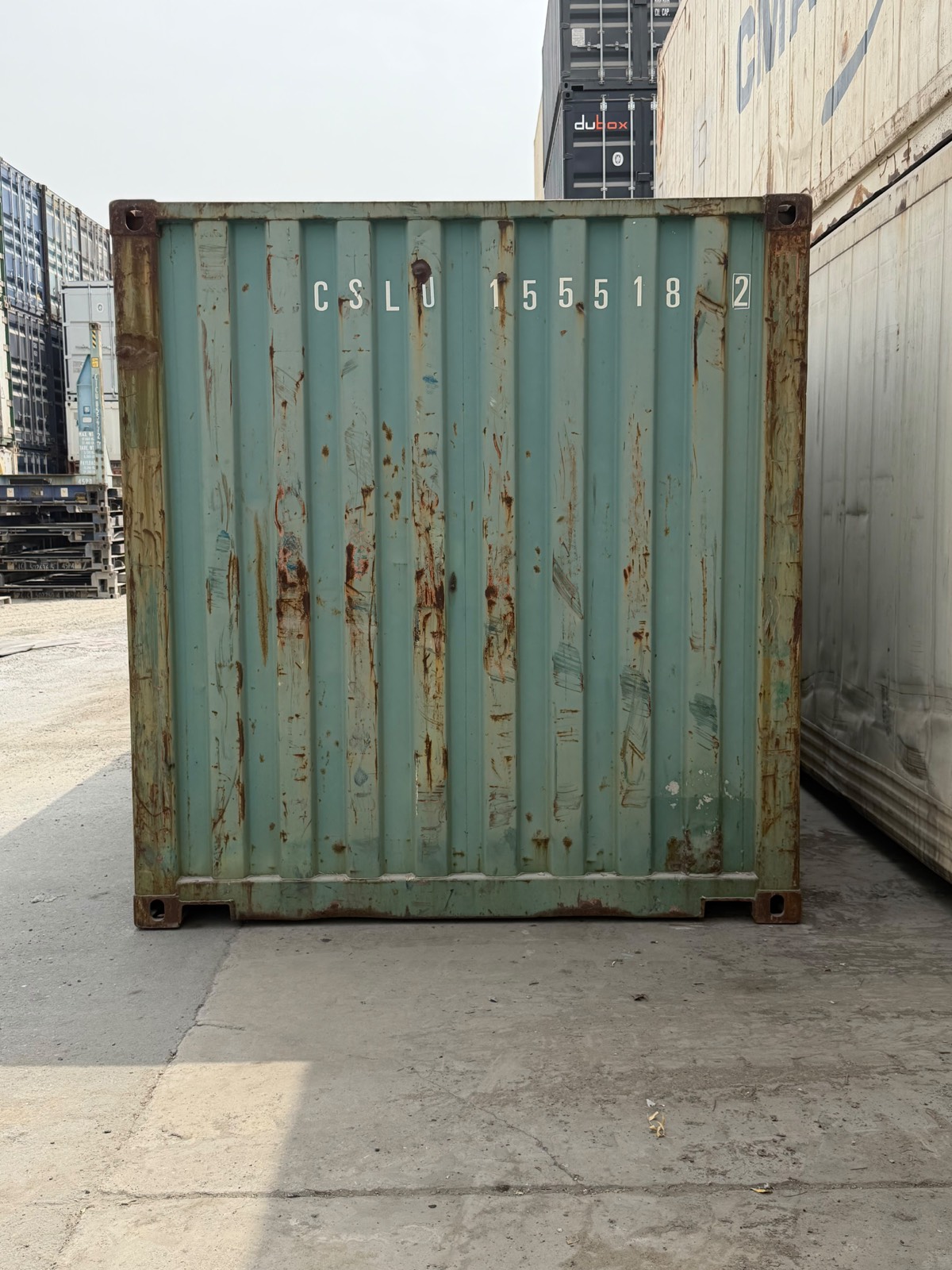 Used shipping container from our UAE yard, weathered but structurally sound